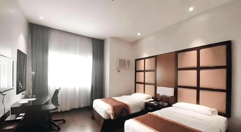 Bed in Avenue Suites