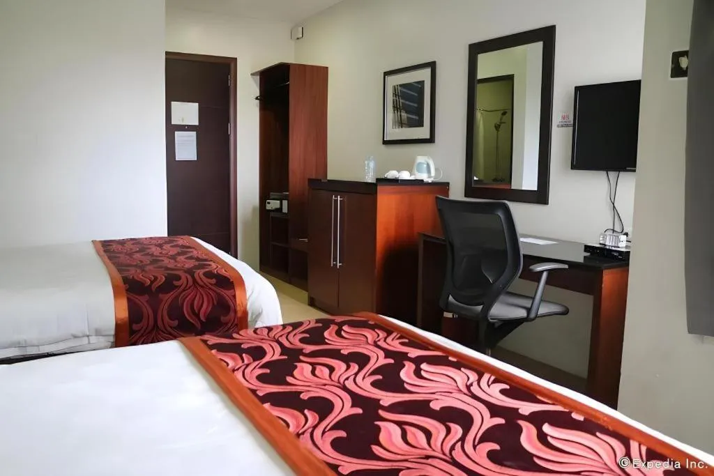 Bed in Avenue Suites