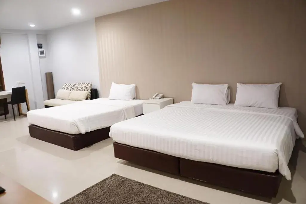 Bed in The One Residence Hotel Bed in The One Residence Hotel