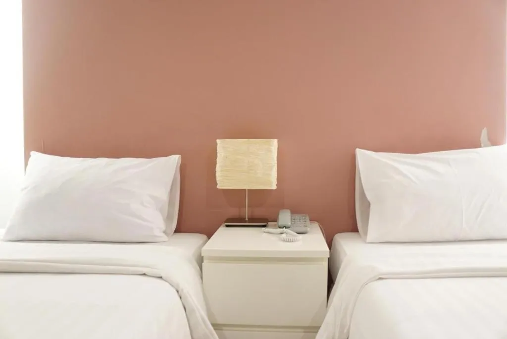 Bed in The One Residence Hotel