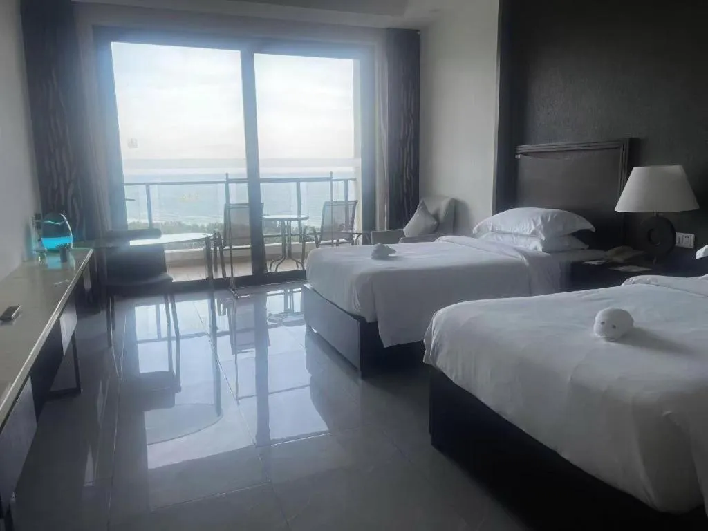 Bed in Boao Holliyard Hotel