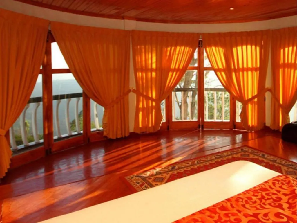 Bed in The Hideaway Hotel