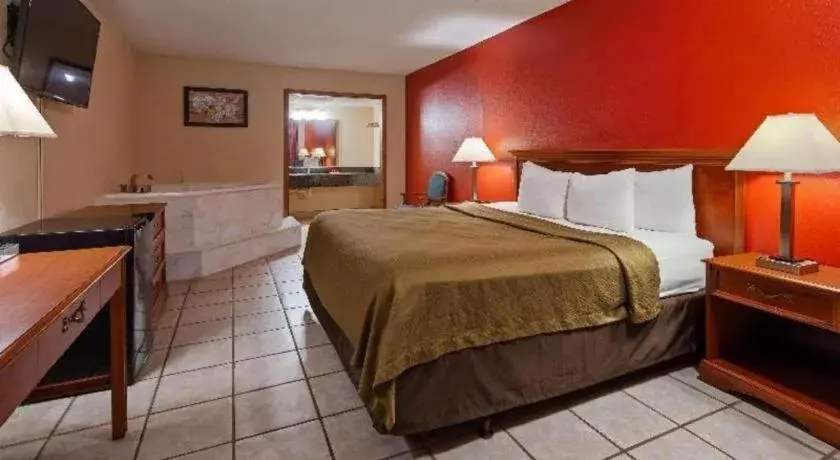 Bed in SureStay Hotel Bed in SureStay Hotel