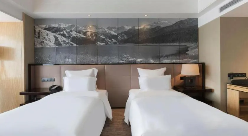 Bed in U Hotel Urumqi