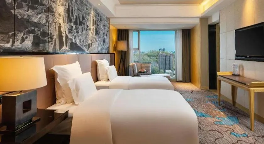 Bed in U Hotel Urumqi