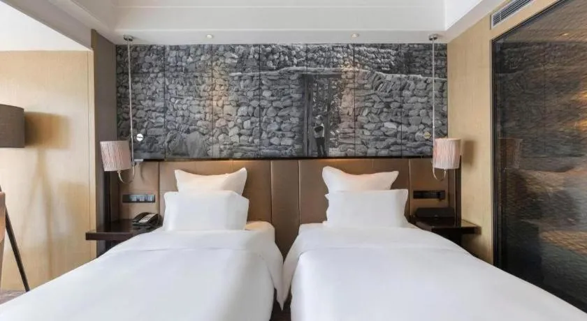 Bed in U Hotel Urumqi