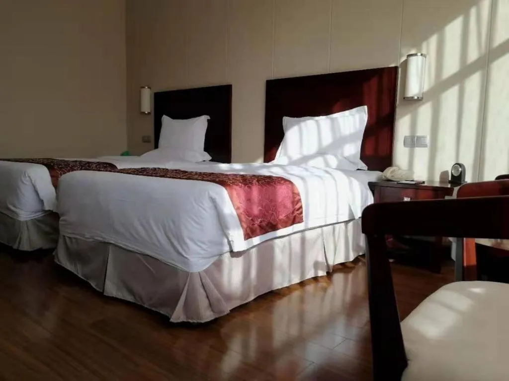 Bed in Ramada by Wyndham Suzhou Luzhi