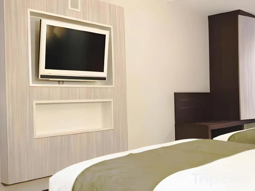 Bed in M - Regency Hotel