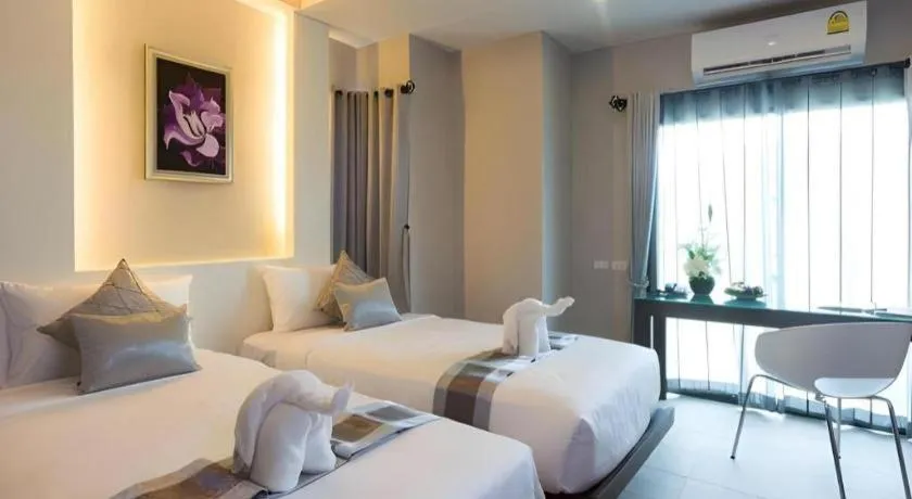 Bed in Vulcano Hotel at Nimman