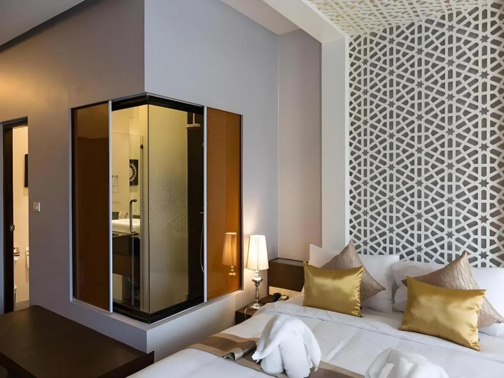 Bed in Vulcano Hotel at Nimman