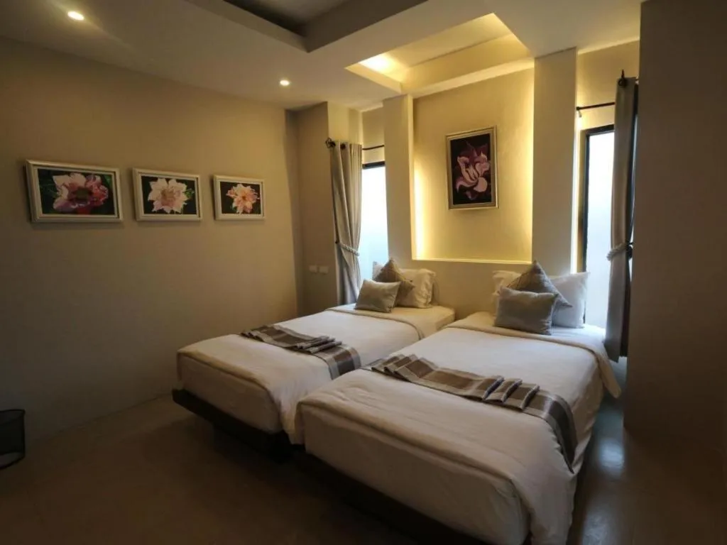 Bed in Vulcano Hotel at Nimman