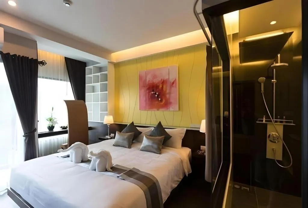 Bed in Vulcano Hotel at Nimman