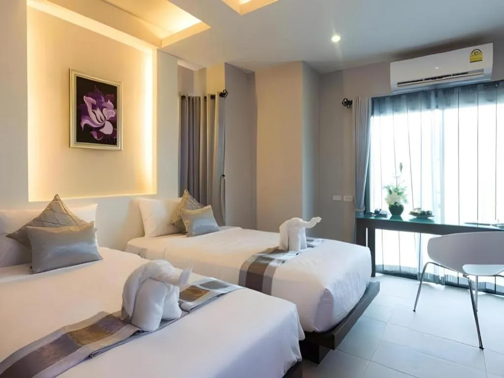 Bed in Vulcano Hotel at Nimman