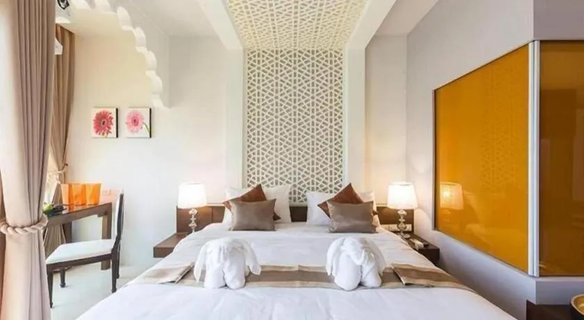 Bed in Vulcano Hotel at Nimman