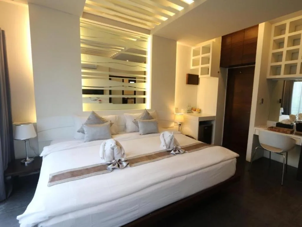 Bed in Vulcano Hotel at Nimman