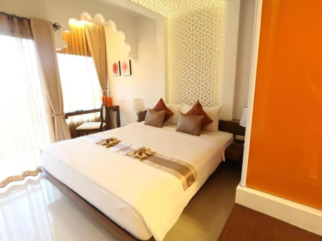 Bed in Vulcano Hotel at Nimman