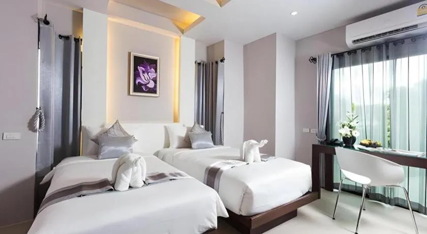 Bed in Vulcano Hotel at Nimman