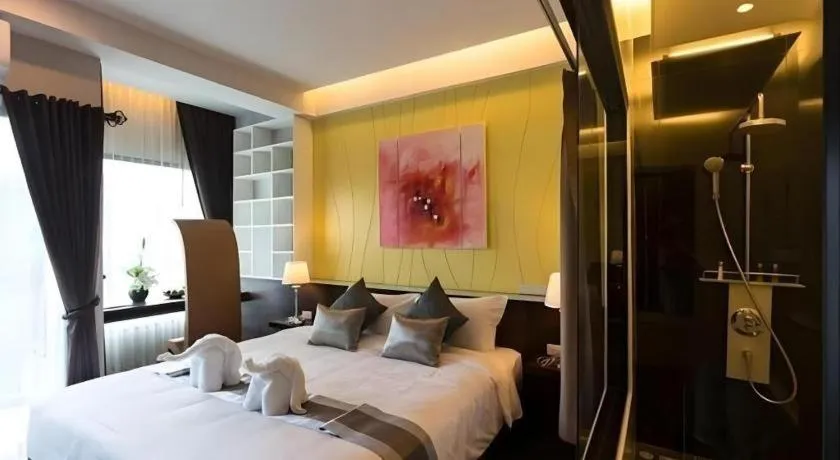 Bed in Vulcano Hotel at Nimman