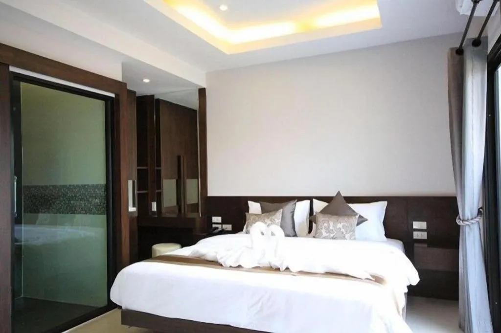 Bed in Vulcano Hotel at Nimman