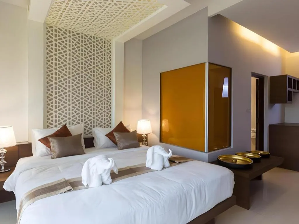 Bed in Vulcano Hotel at Nimman