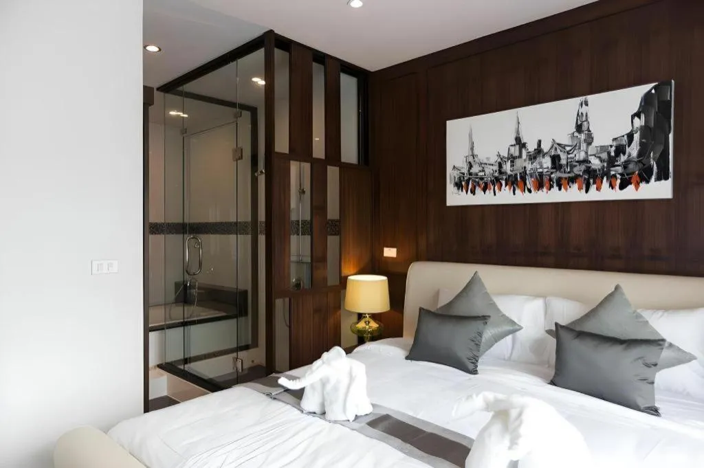 Bed in Vulcano Hotel at Nimman