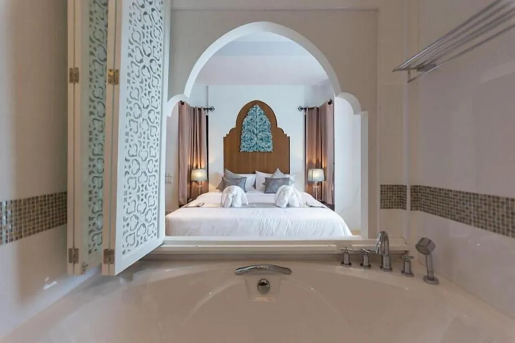 Bed in Vulcano Hotel at Nimman