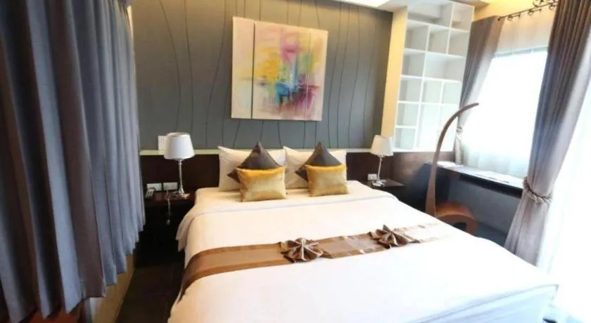 Bed in Vulcano Hotel at Nimman