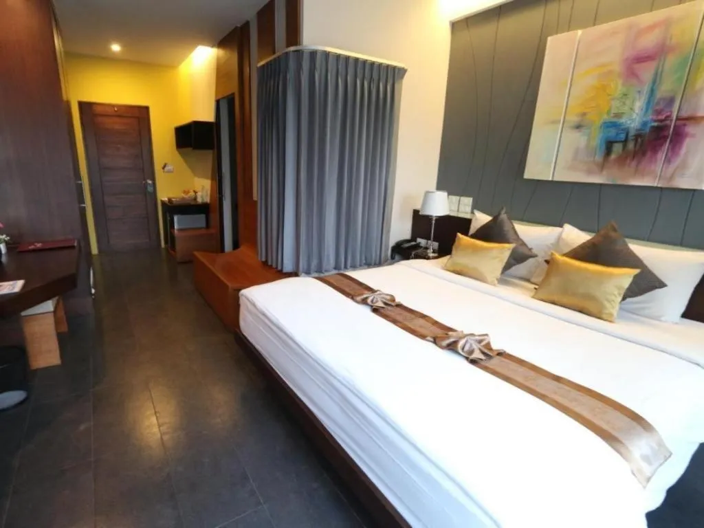 Bed in Vulcano Hotel at Nimman