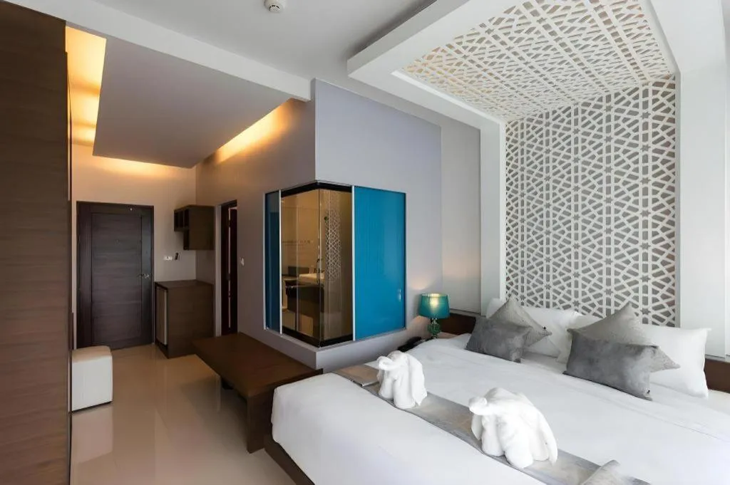 Bed in Vulcano Hotel at Nimman