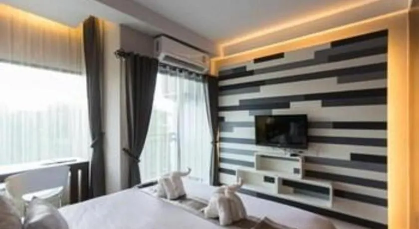 Bed in Vulcano Hotel at Nimman