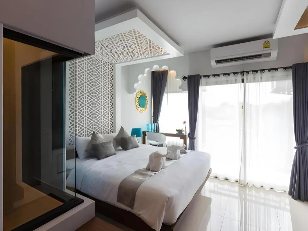 Bed in Vulcano Hotel at Nimman