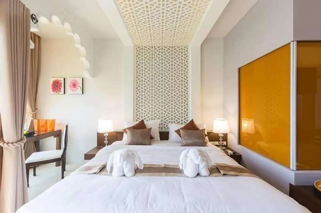 Bed in Vulcano Hotel at Nimman