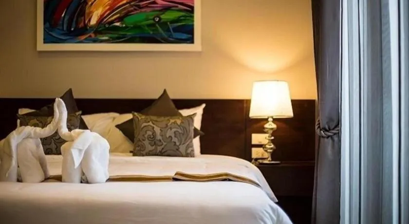 Bed in Vulcano Hotel at Nimman