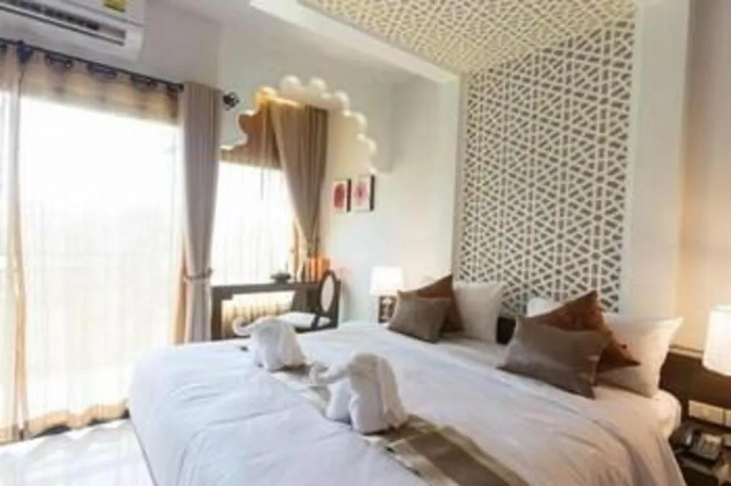 Bed in Vulcano Hotel at Nimman