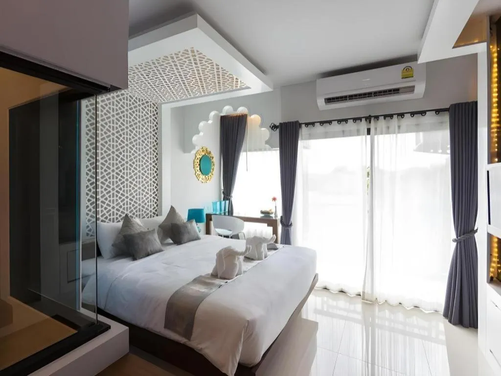 Bed in Vulcano Hotel at Nimman