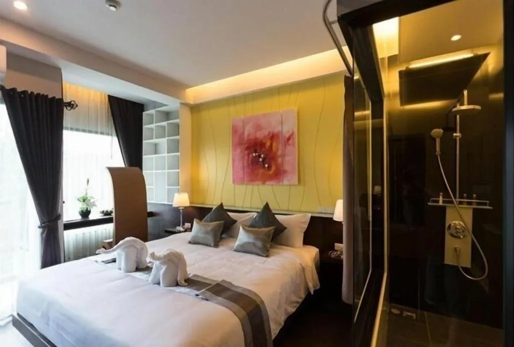 Bed in Vulcano Hotel at Nimman