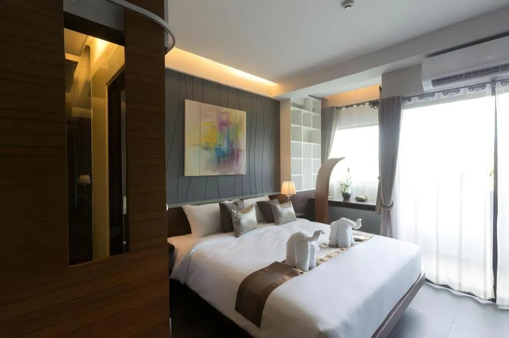 Bed in Vulcano Hotel at Nimman