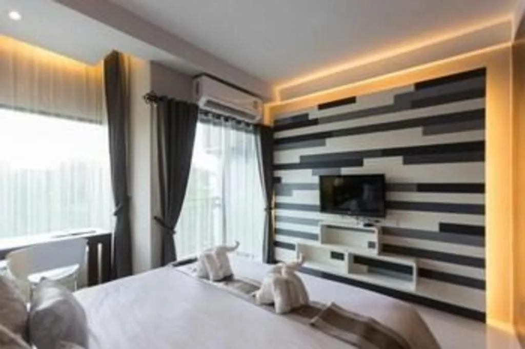 Bed in Vulcano Hotel at Nimman