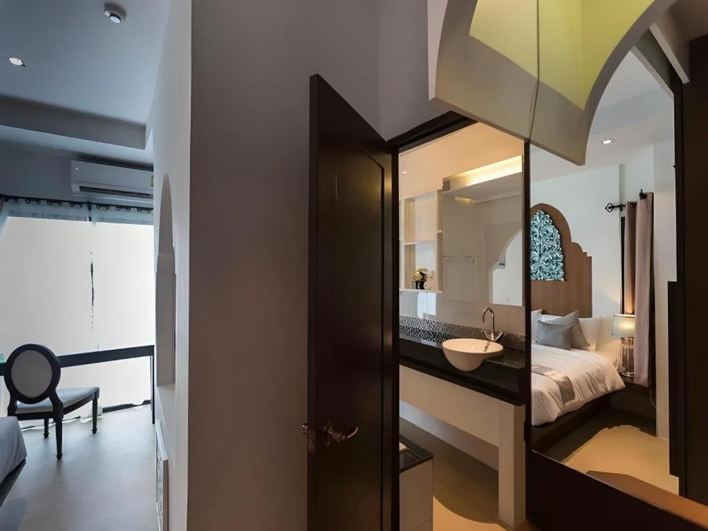 Bed in Vulcano Hotel at Nimman