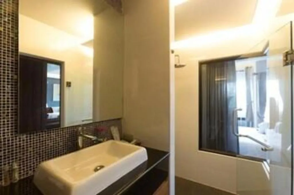 Bed in Vulcano Hotel at Nimman