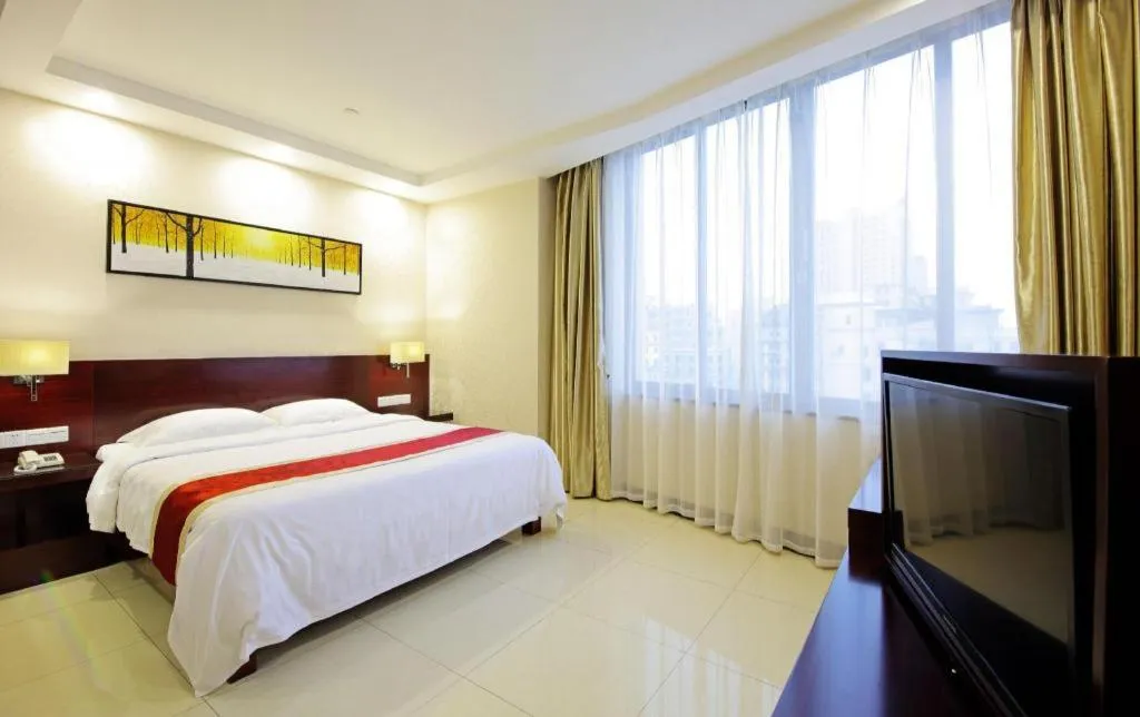 Bed in Nanfang Dasha Hotel