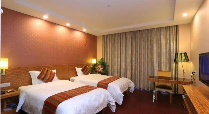 Bed in Nanfang Dasha Hotel