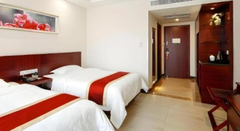 Bed in Nanfang Dasha Hotel