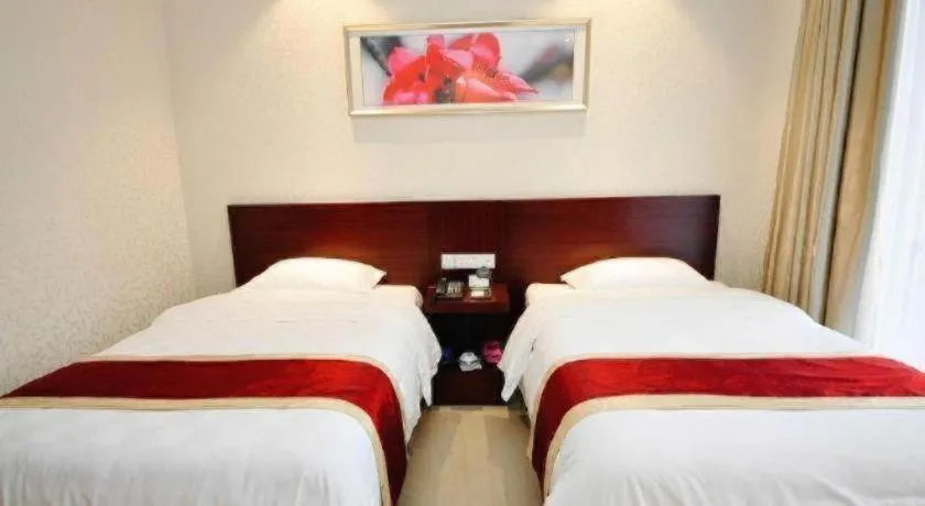 Bed in Nanfang Dasha Hotel