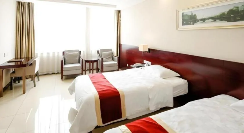 Bed in Nanfang Dasha Hotel