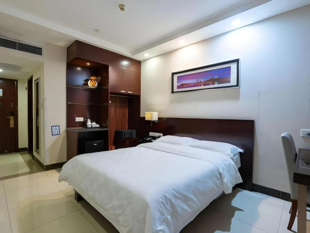Bed in Nanfang Dasha Hotel