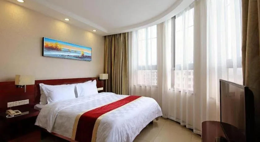 Bed in Nanfang Dasha Hotel