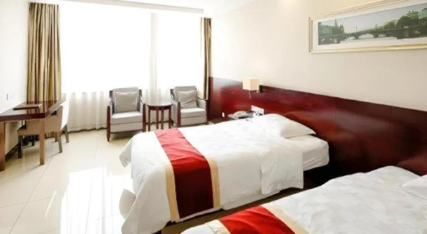 Bed in Nanfang Dasha Hotel