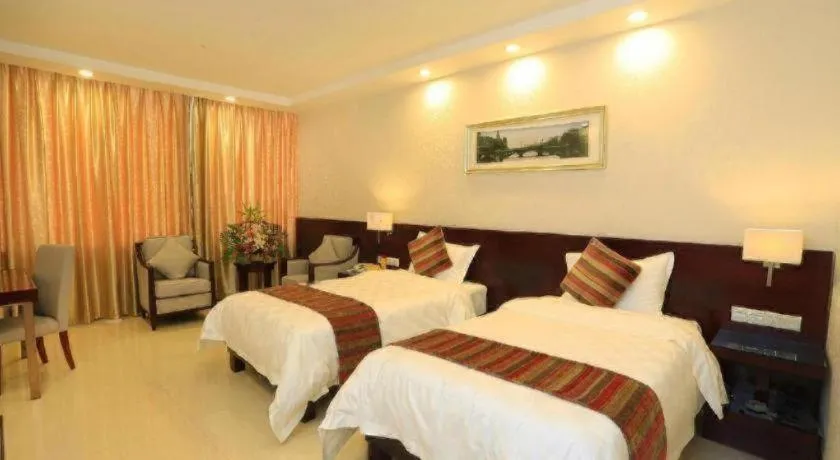 Bed in Nanfang Dasha Hotel