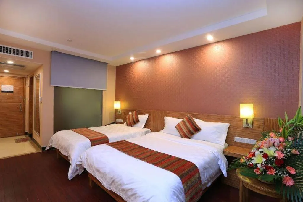 Bed in Nanfang Dasha Hotel